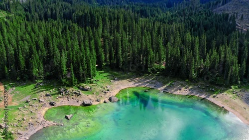 Majestic aerial view of Carezza lake in Dolomites photo