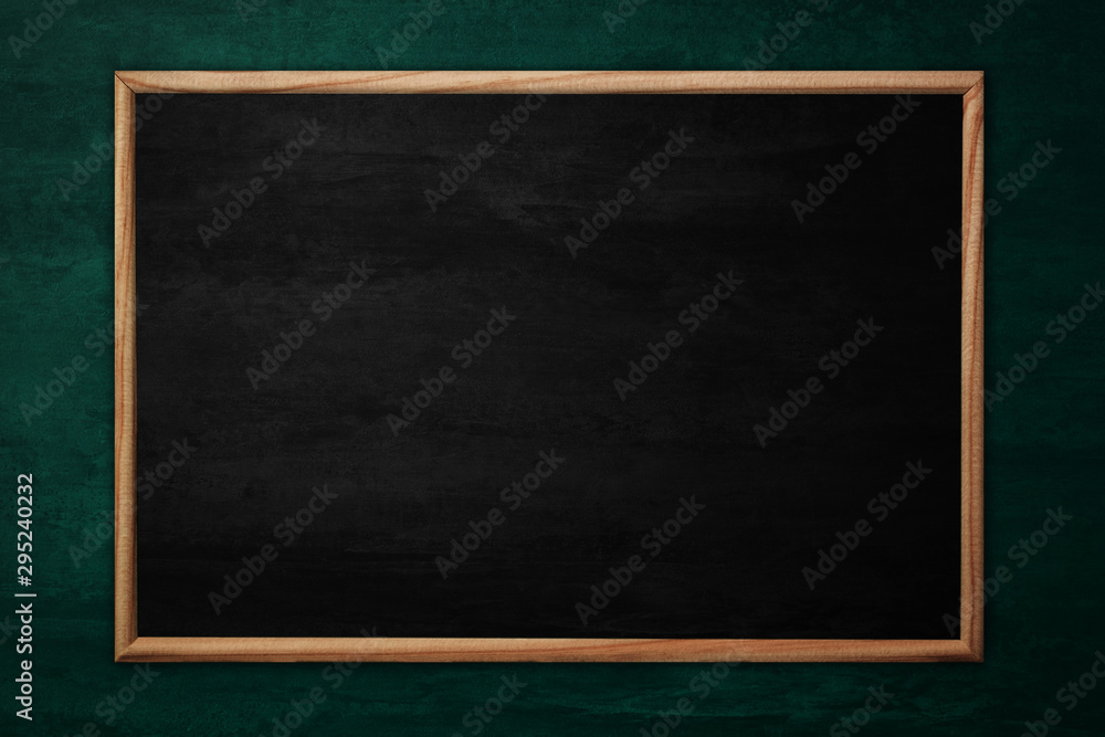 Abstract blackboard or chalkboard with frame on wooden background. Abstract blackboard or chalkboard with frame on wooden background.