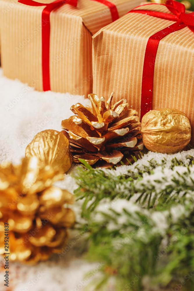 Decorated present on snowy wooden table close up Decorated present on snowy wooden table close up