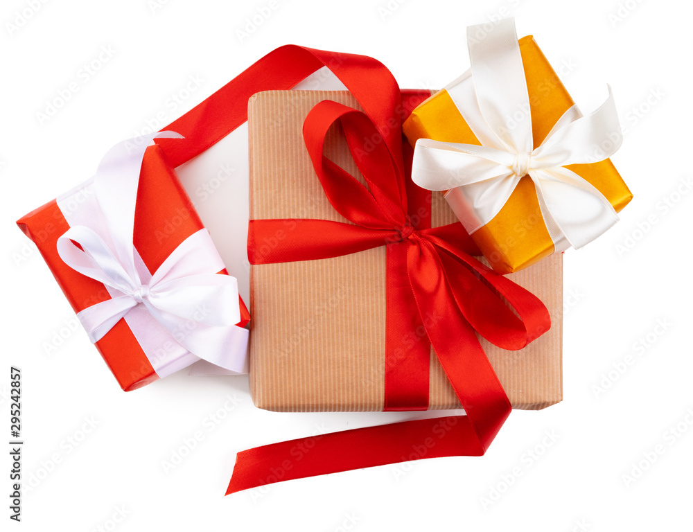 Three beautiful wrapped gifts isolated on white background