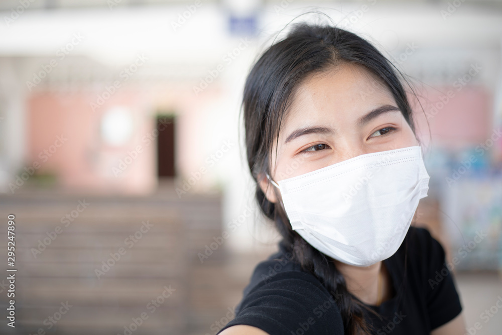 Women wearing masks to protect against germs and air pollution. Women wearing masks to protect against germs and air pollution.