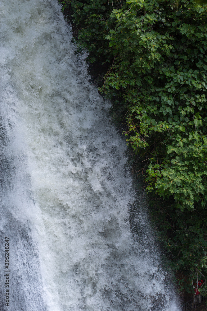 interesting unusual visible on a mountain waterfall on a sunny day for background or screensaver, interesting unusual visible on a mountain waterfall on a sunny day for background or screensaver,