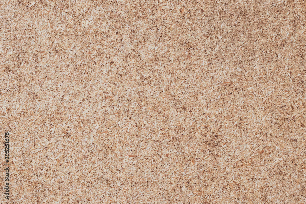Plywood background. Cork texture, wood panel, chipboard. Desk surface. Natural color. Plywood background. Cork texture, wood panel, chipboard. Desk surface. Natural color.