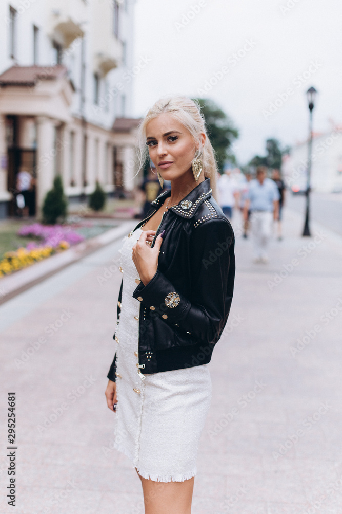 Fototapeta premium Fashion photosession of professional model in the city. Fashion, trendy concept
