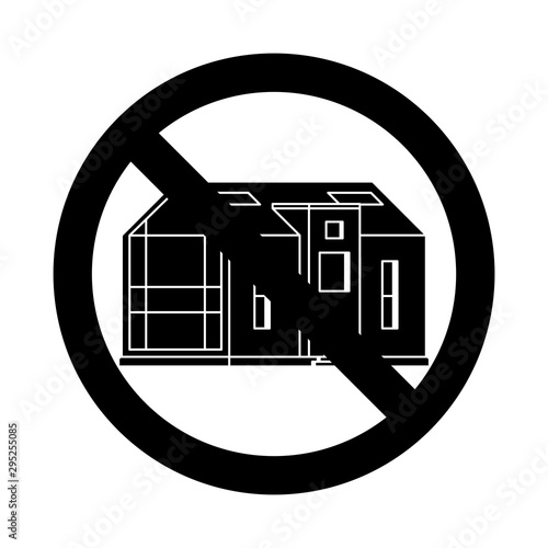 Silhouette of modern cottage in prohibition sign on a white background 