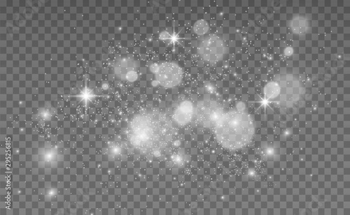 Beautiful sparks shine with special light. Vector sparkles on a transparent background. Christmas abstract pattern. A beautiful illustration for the postcard. The background for the image. Luminaries.