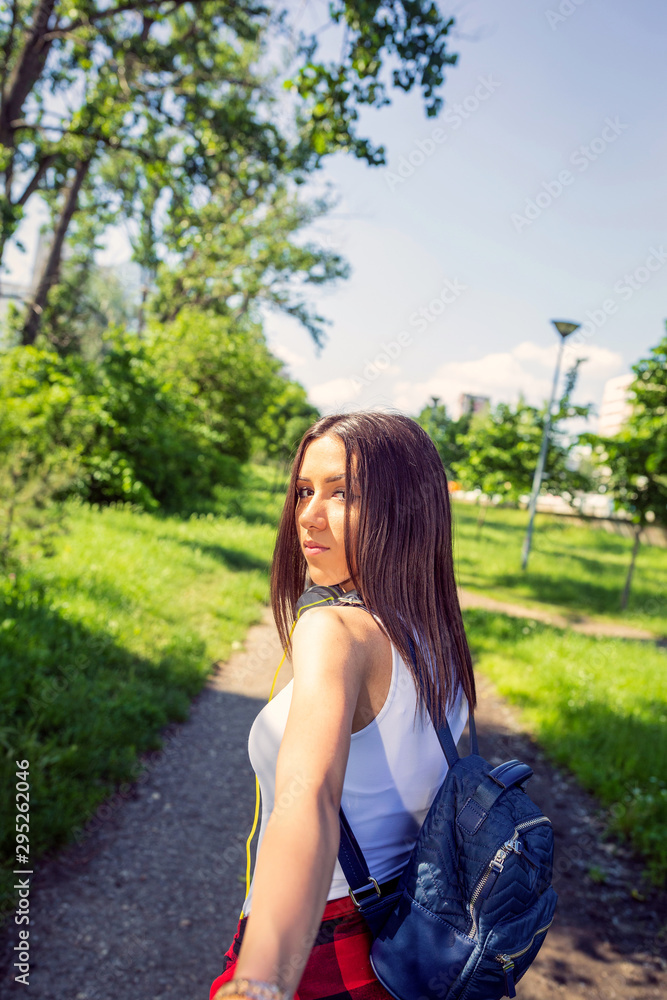 Beautiful girl walking on street. Beautiful girl walking on street.