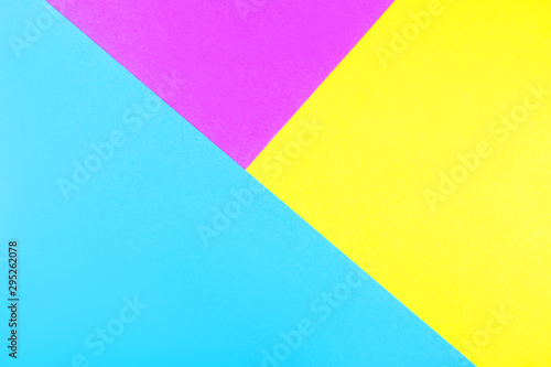 Creative geometric neon paper background. Blue, magenta and yellow colors.