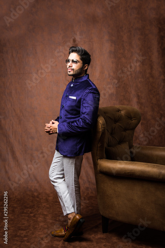 Photography Indian Man wears ethnic or traditional cloths,  fashion model with purple coat a