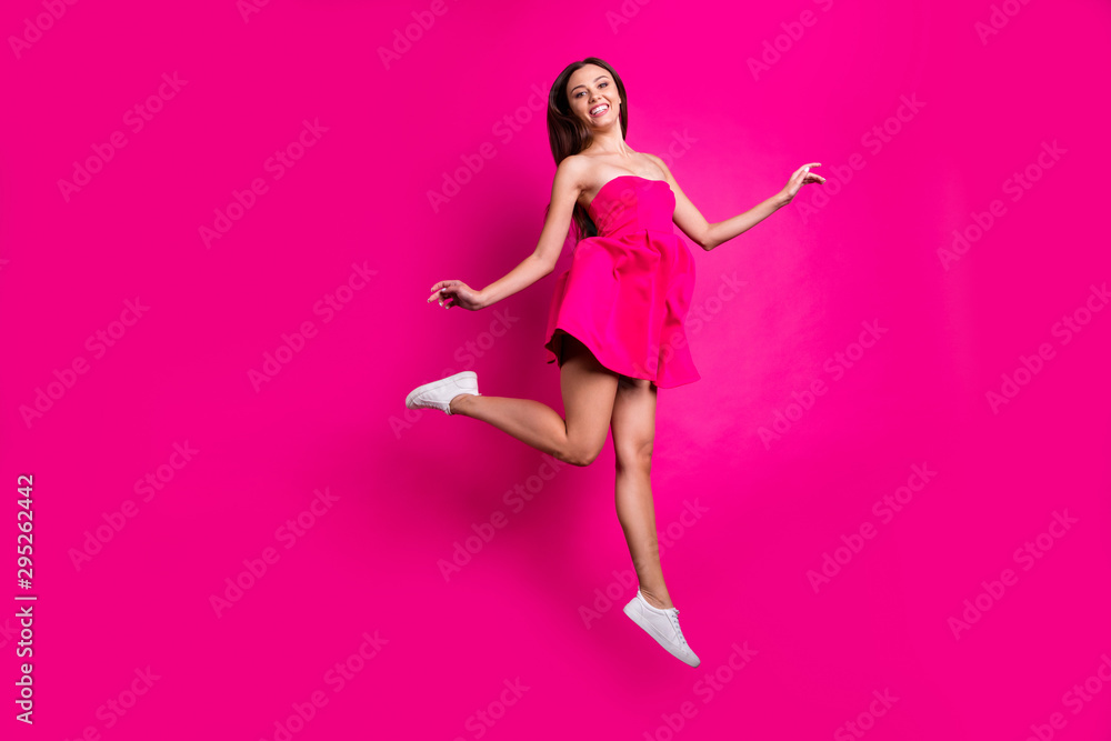 Full length body size view of her she nice attractive lovable cheerful long-haired girl flying having fun enjoying free time isolated on bright vivid shine vibrant pink fuchsia color background Full length body size view of her she nice attractive lovable cheerful long-haired girl flying having fun enjoying free time isolated on bright vivid shine vibrant pink fuchsia color background