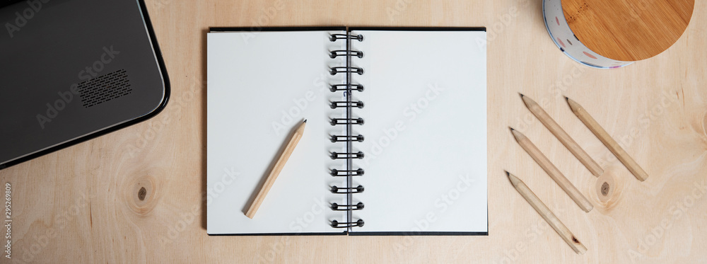 Notebook with empty space on the wooden office desk background with ...