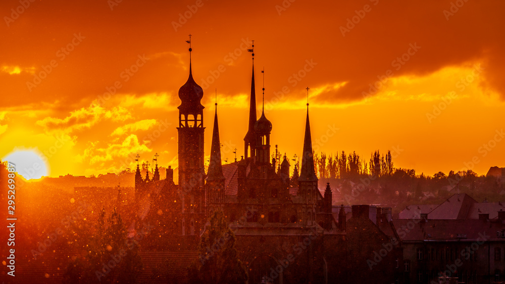 The cityscape with churches at sunset