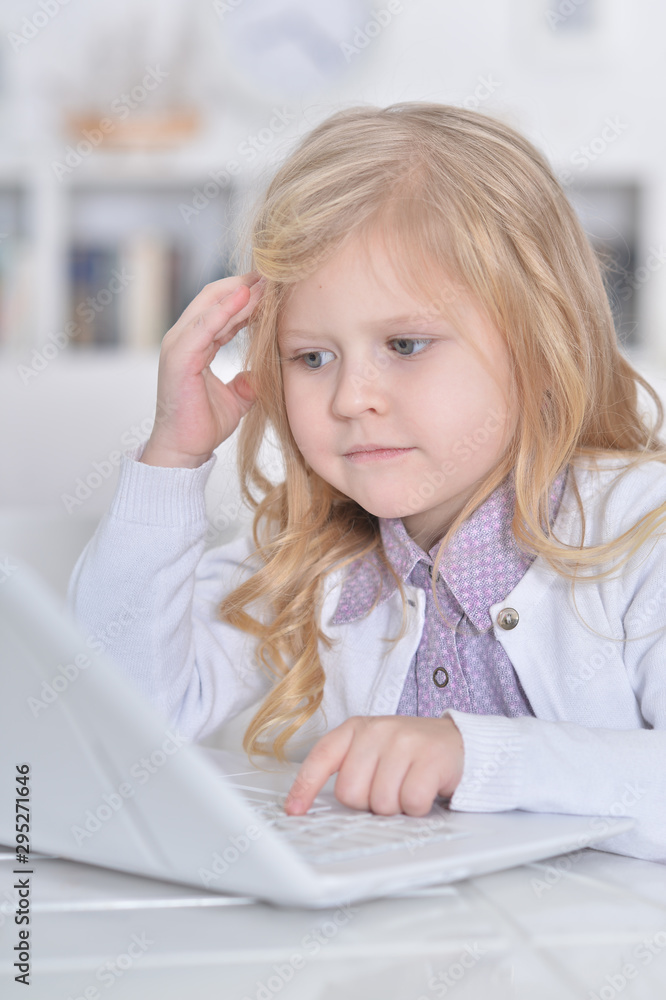 Portrait of cute smiling girl drawing at home Portrait of cute smiling girl drawing at home