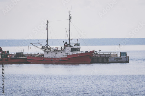 Kronstadt / Russia - 14/07/2018: Small boats moored to the pier