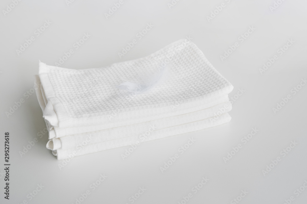 High view stacked white towels High view stacked white towels