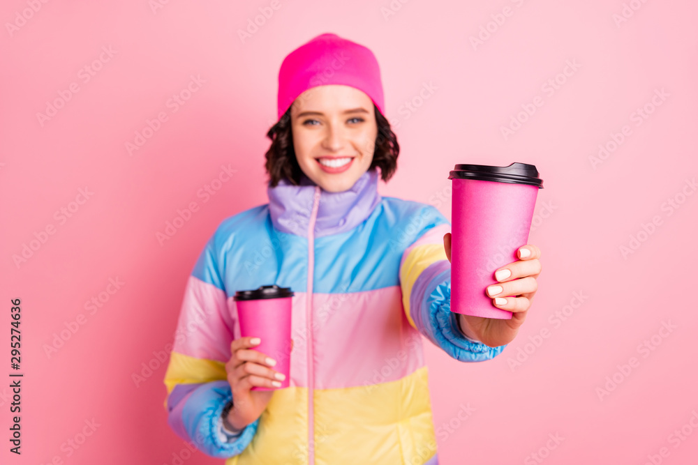 Portrait of her she nice attractive cheerful cheery girl holding in hands two take-out cups of green herbal tea giving to you isolated over pink pastel background Portrait of her she nice attractive cheerful cheery girl holding in hands two take-out cups of green herbal tea giving to you isolated over pink pastel background