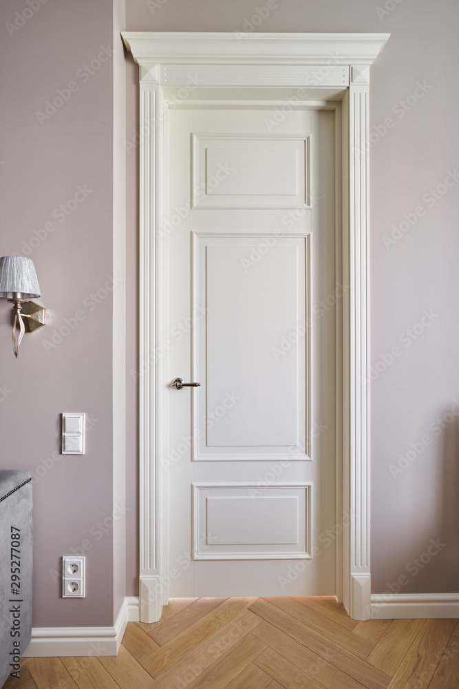 white door in classic style with steel handle white door in classic style with steel handle