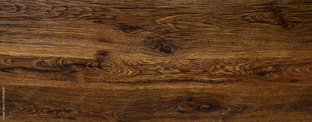 Polished wood surface. The background of polished wood texture. Polished wood surface. The background of polished wood texture.