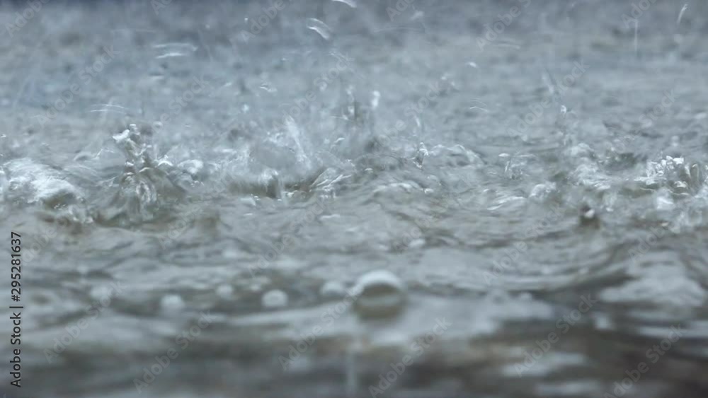 The Heavy rain drops on concrete floor The Heavy rain drops on concrete floor