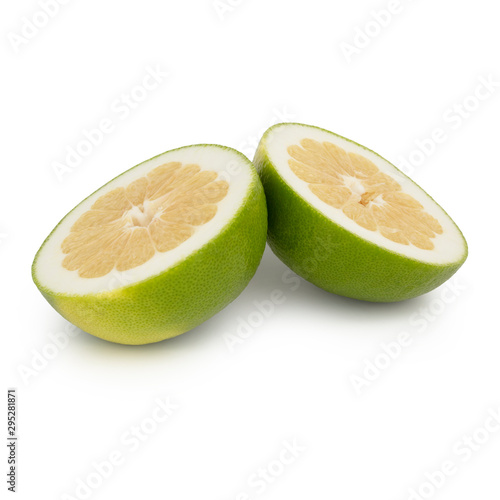 Fresh green grapefruit / pomelo half cut into two equal parts with a juicy yellow pulp. Isolated on white background. Side view.