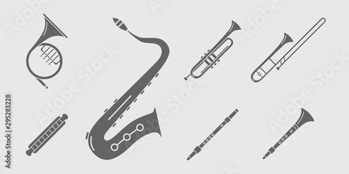 Music instruments Icons set - Vector solid silhouettes of wind instruments, saxophone, sax, tube, mouth organ and flute for the site or interface