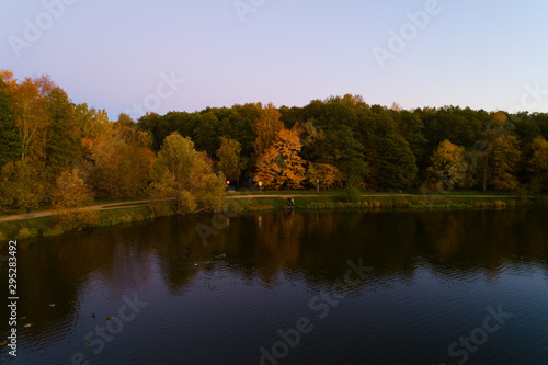 Evening autumn landscape in Izmailovsky park with a pond.