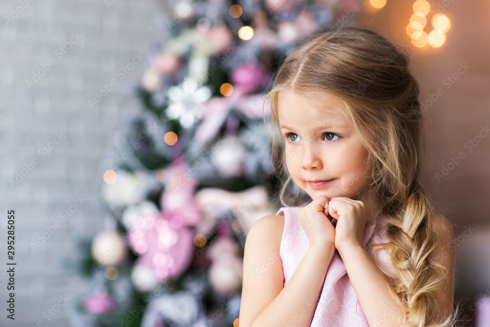 Little cute girl near christmas tree Little cute girl near christmas tree