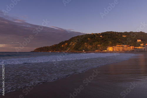 Sunset in San Sebastian  Zuriola beach Spain. Sunset over the sea.