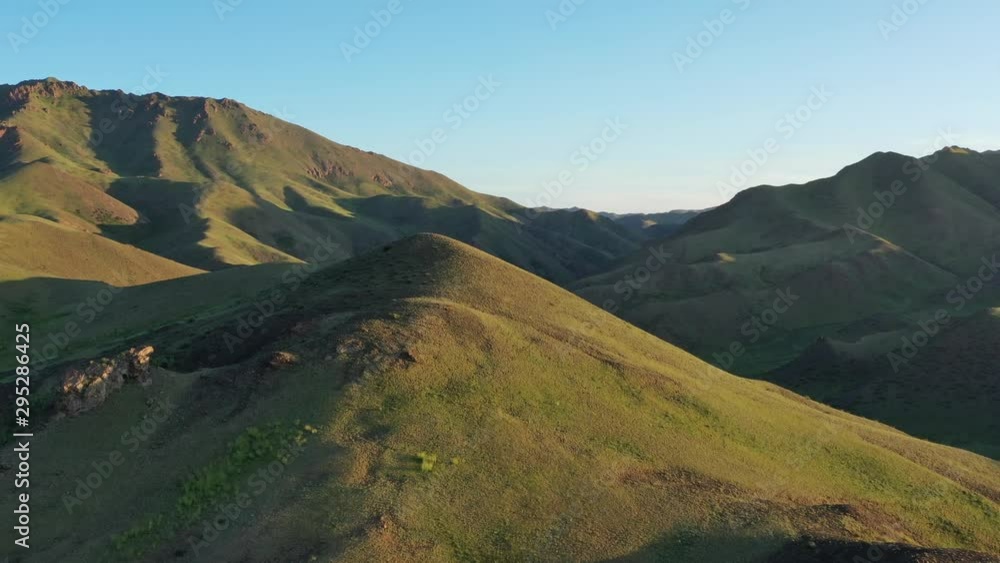Aerial view of mountains landscape in Yol Valley at sunset, Mongolia, 4k Aerial view of mountains landscape in Yol Valley at sunset, Mongolia, 4k