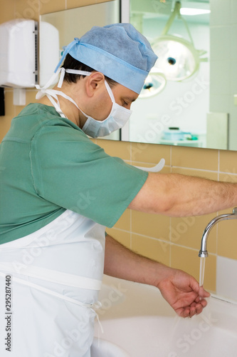 Surgeon Washing his Hands in Operating Room