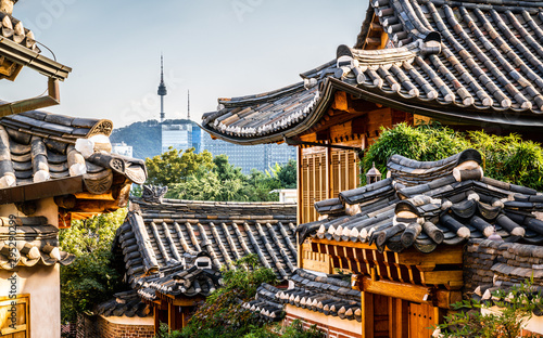 Bukchon Hanok village scenic view in Seoul with view on roofs and tower in the distance in Korea