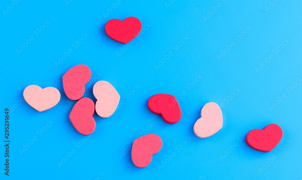 Pink hearts on a blue background