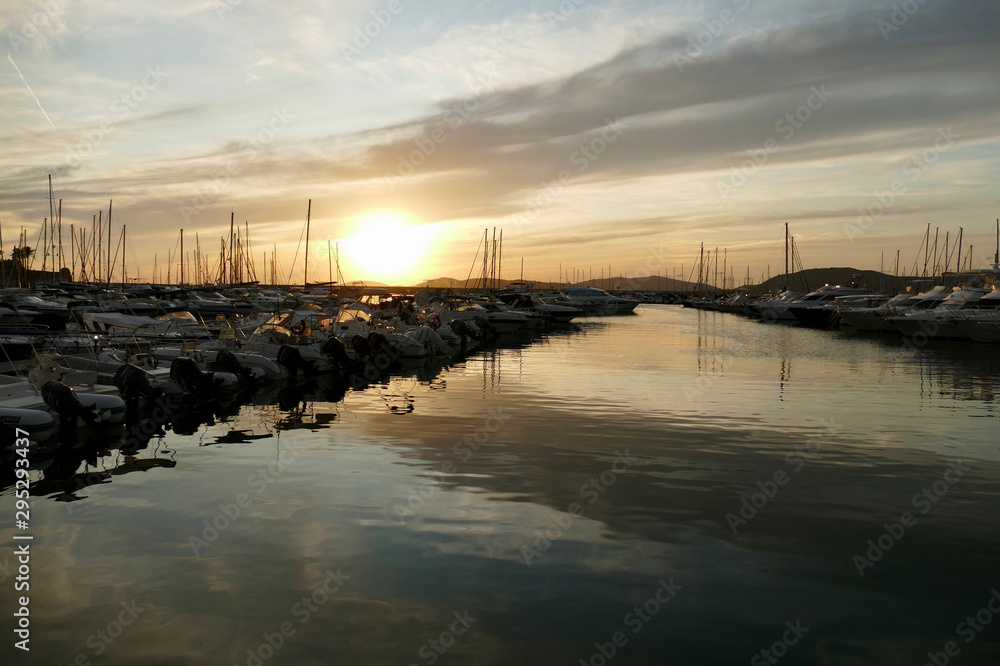 Panoramic view of marina at sunset. Colorful landscape on a summer night in Alghero, Sardinia, Italy.
