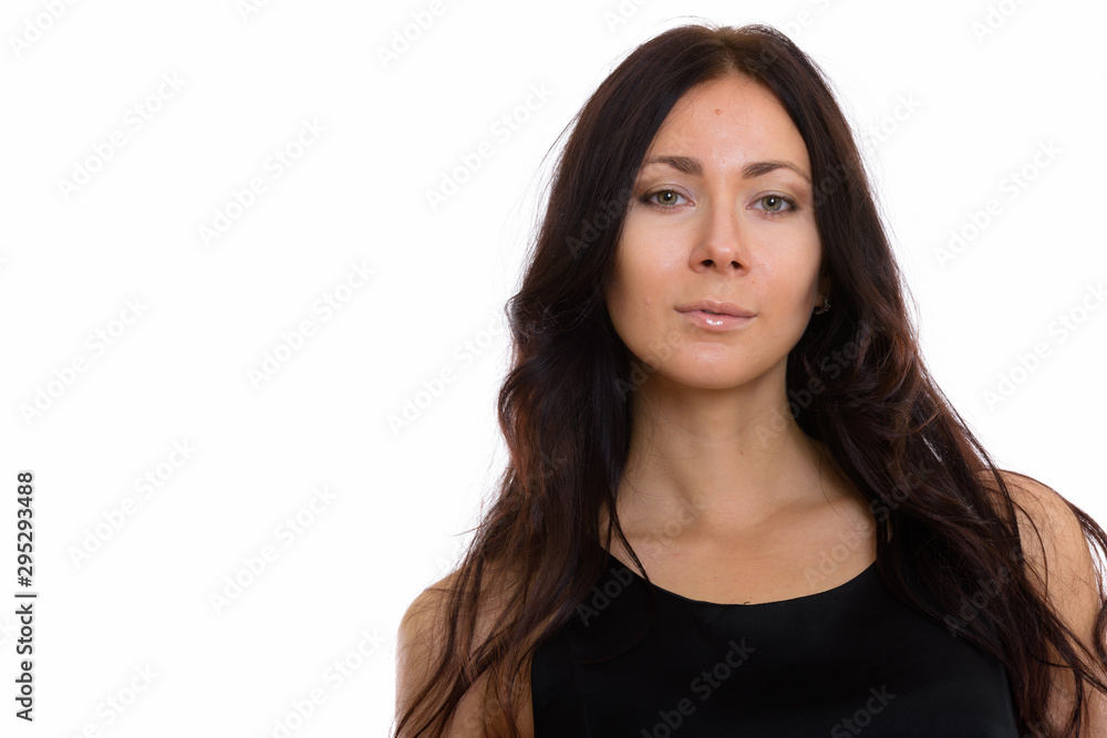 Studio portrait of beautiful young woman isolated against white background Studio portrait of beautiful young woman isolated against white background