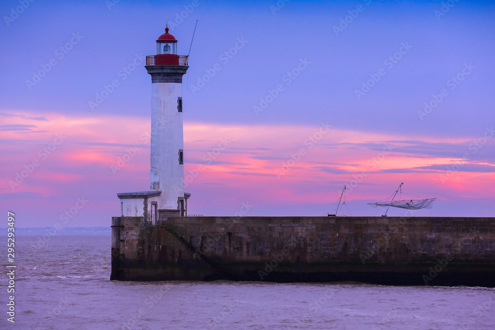 Beautiful evening sky and lighthouse in France