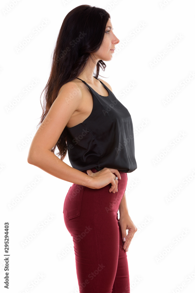 Profile view of young beautiful businesswoman posing Profile view of young beautiful businesswoman posing