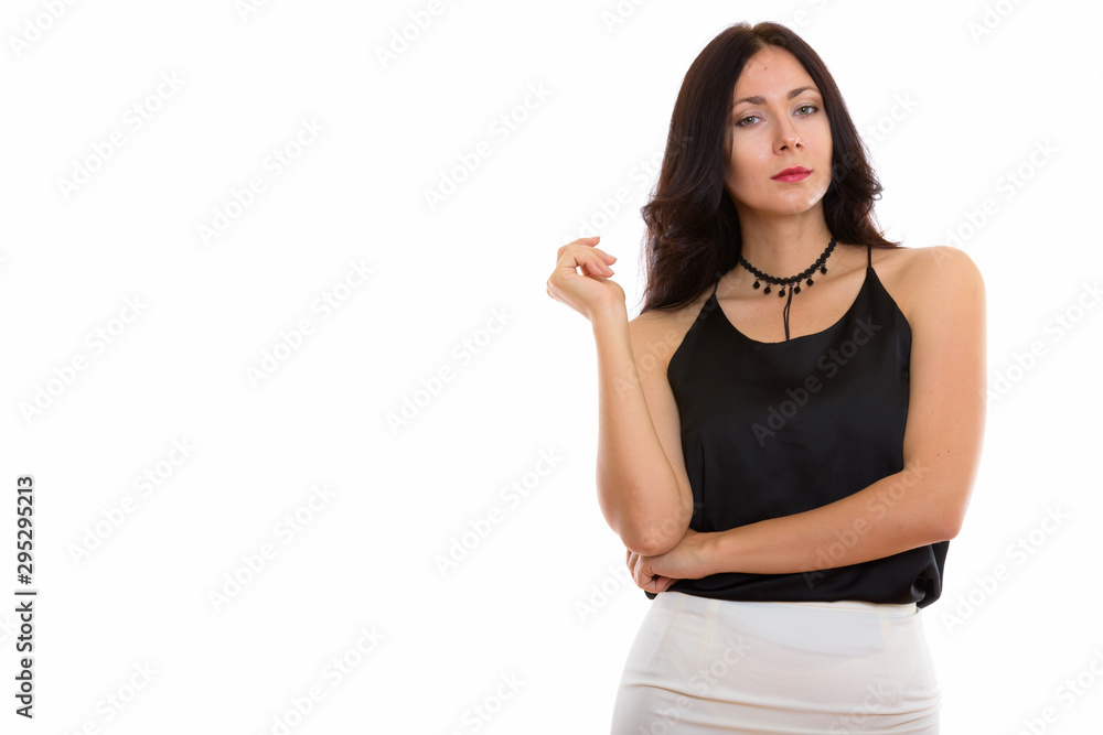 Studio portrait of beautiful young woman isolated against white background