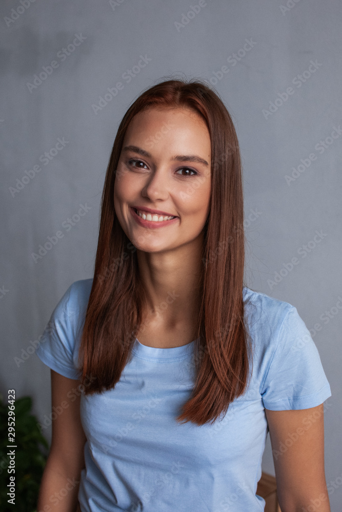 Beautiful young woman face closeup, brown hair Beautiful young woman face closeup, brown hair