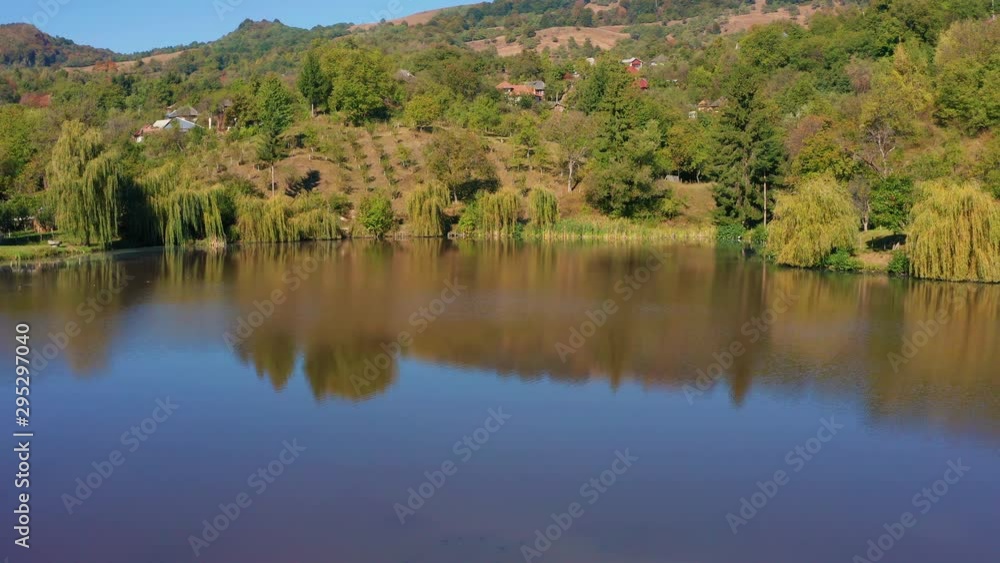 Aerial images of Lake Invartita, Nucsoara (is the largest karst lake formed on gypsum (calcium sulphate and soluble rock) From Romania. Aerial images of Lake Invartita, Nucsoara (is the largest karst lake formed on gypsum (calcium sulphate and soluble rock) From Romania.