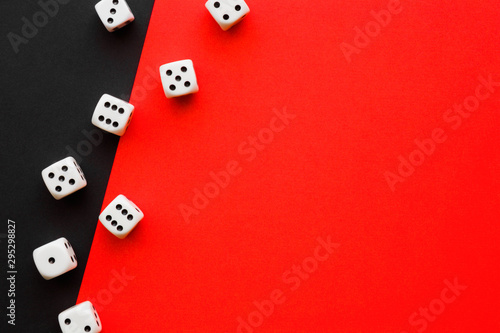 Fotografía White casino dices on black and bright red background
