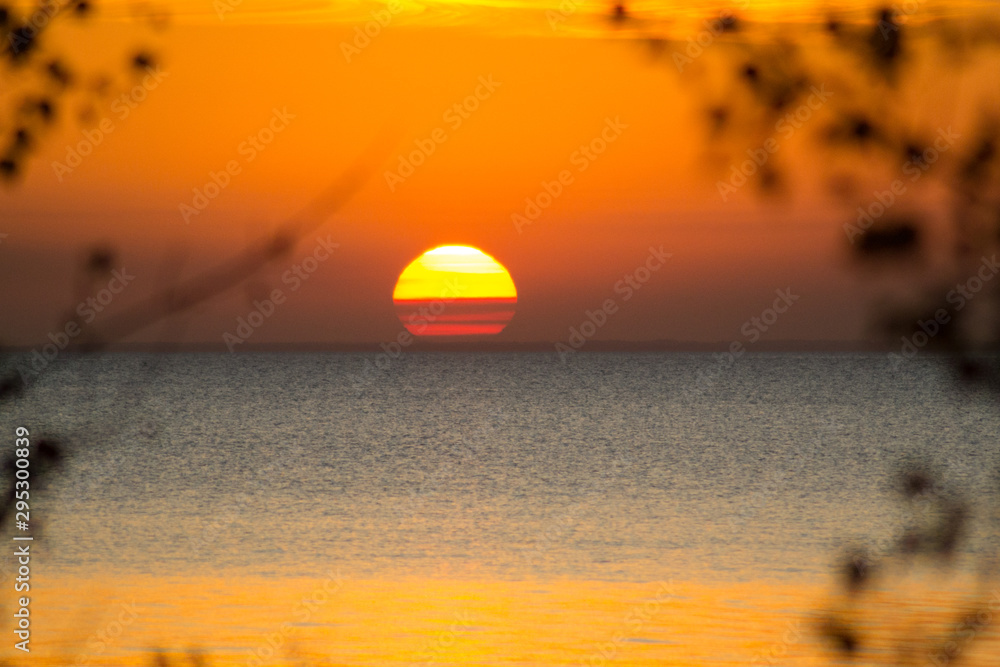 Sunset on the sea, in warm yellow tones. Sunset on the sea, in warm yellow tones.