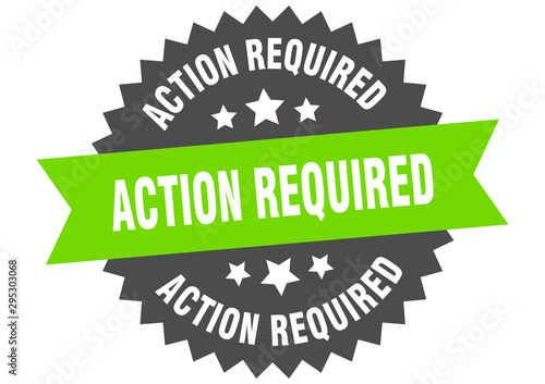 action required sign. action required green-black circular band label