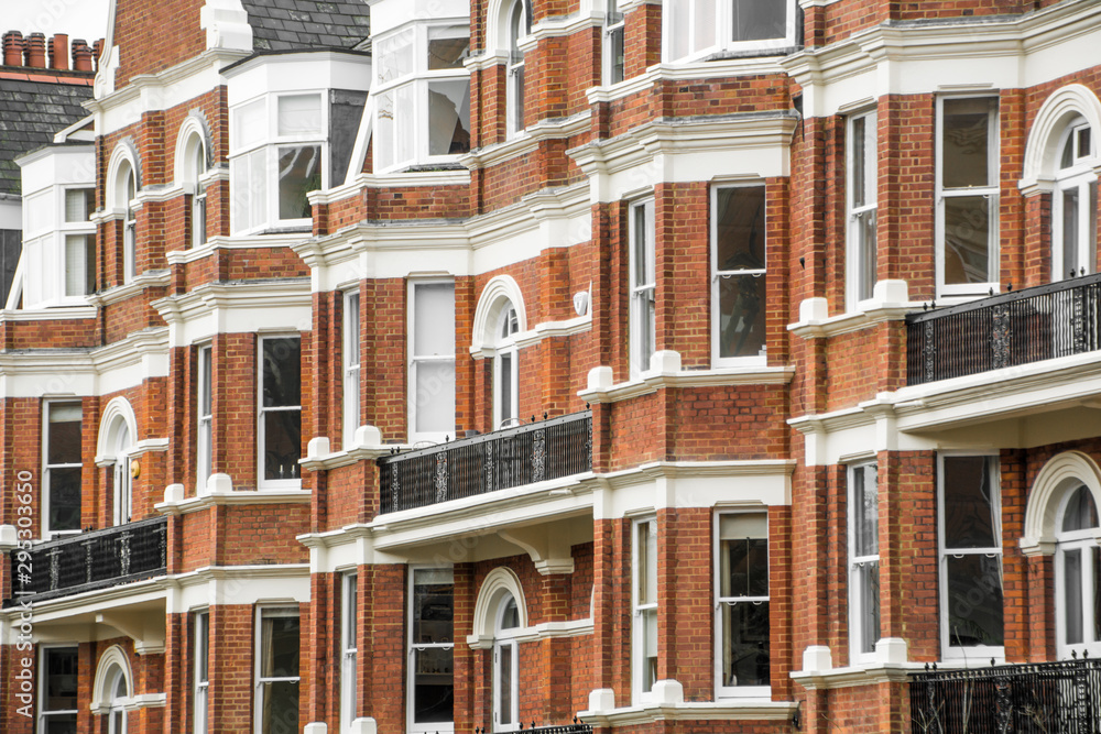 Close up of red brick London townhouses