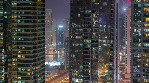 Residential and office buildings in Jumeirah lake towers district night timelapse in Dubai © neiezhmakov