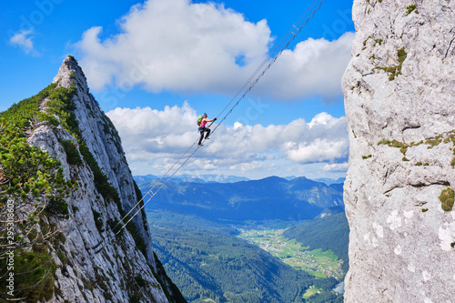 Via ferrata Donnerkogel Intersport Klettersteig in the Austrian Alps, near Gosau. Stairway to Heaven concept.