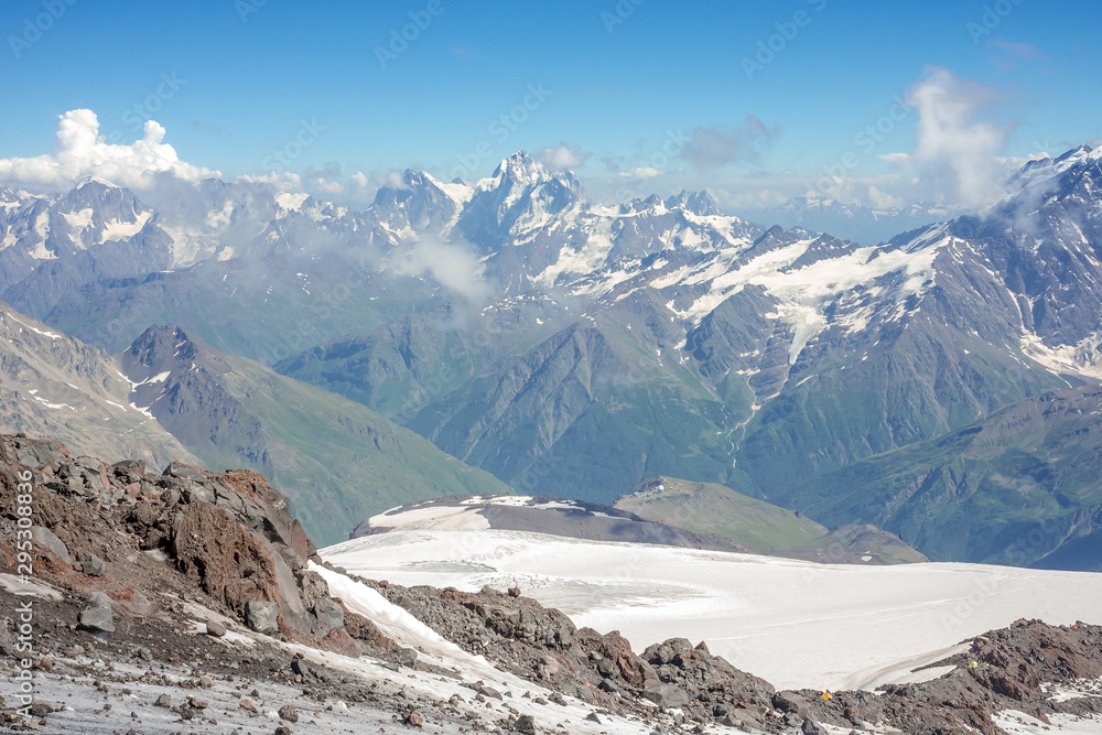 view of the main Caucasian ridge from the slopes of the highest peak in Europe, Mount Elbrus