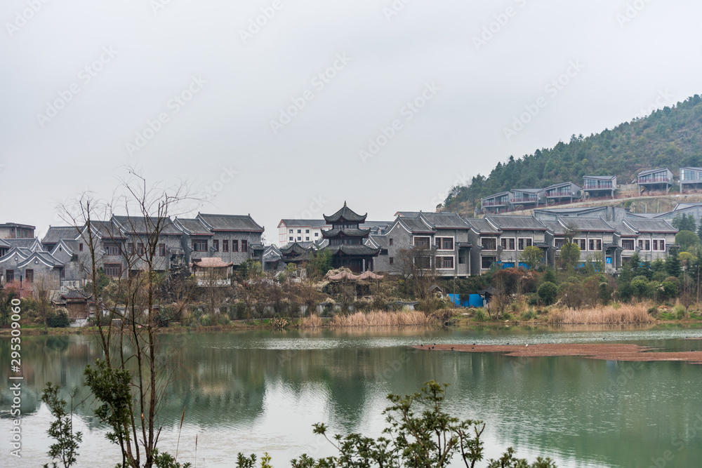 Ming Qing Dynasty Chinese traditional rural house at the lakeside, in Qingyan Ancient town, one of famous old town and popular travel destination in Guiyang, Guizhou Province, China.