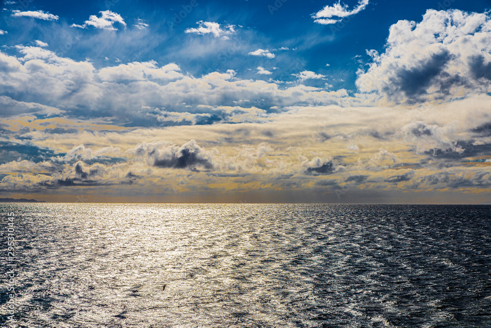 Obraz premium Cloudscape at sunset of the coast of East Attica in Greece