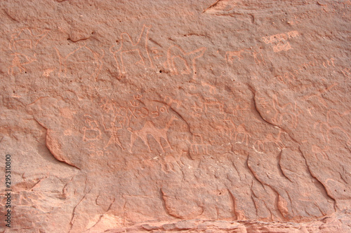 prehistoric engravings on a stone in Wadi Rum desert, Jordan