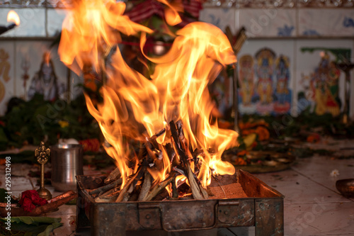 Offering prayer to God in front of holy fire photo
